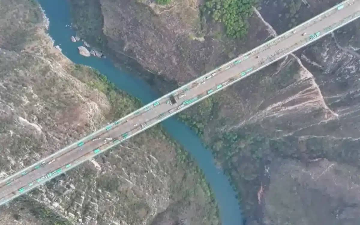 China cut a mountain in half in order to build a highway including the world’s highest bridge